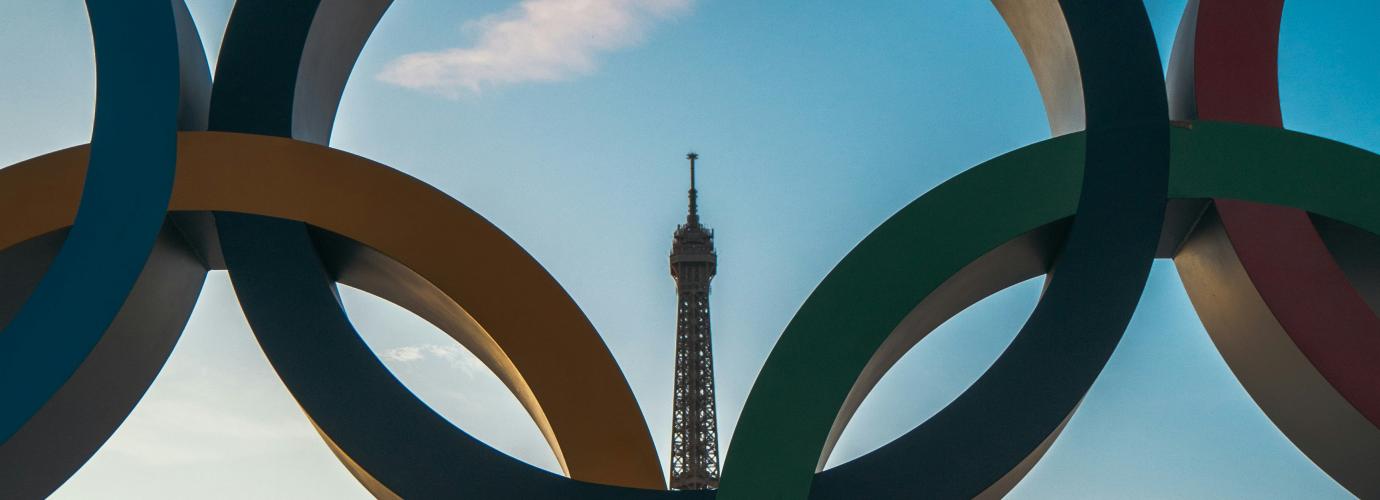 Olympic rings with the Eiffel Tower in the background