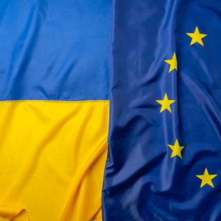 Ukrainian and European flags together Ukrainian and European flags together