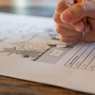 child doing homework child doing homework