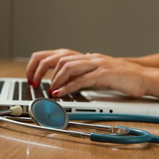 stethoscope and laptop