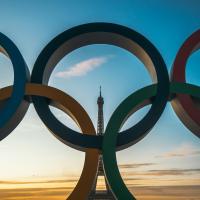 Olympic rings with the Eiffel Tower in the background