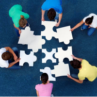 People putting together a puzzle