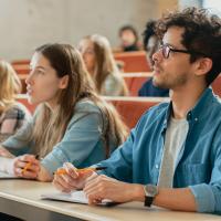 Students sitting in an aula