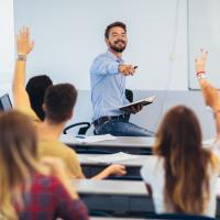 Teacher in front of class Teacher in front of class