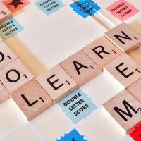 Letters spelling 'schools' and 'learn'